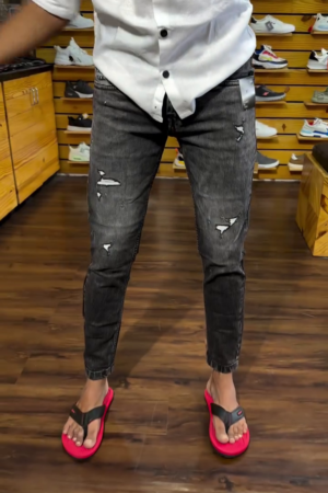 Men Slim Fit Mid Rise Heavy Fade Mildly Distressed Cotton Jeans